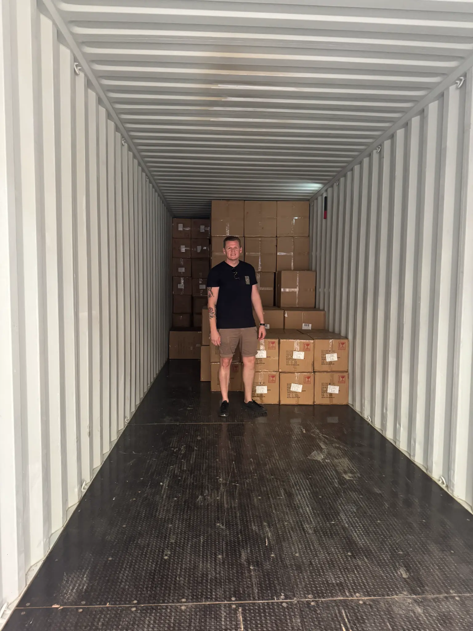 Lyden in shipping container with products